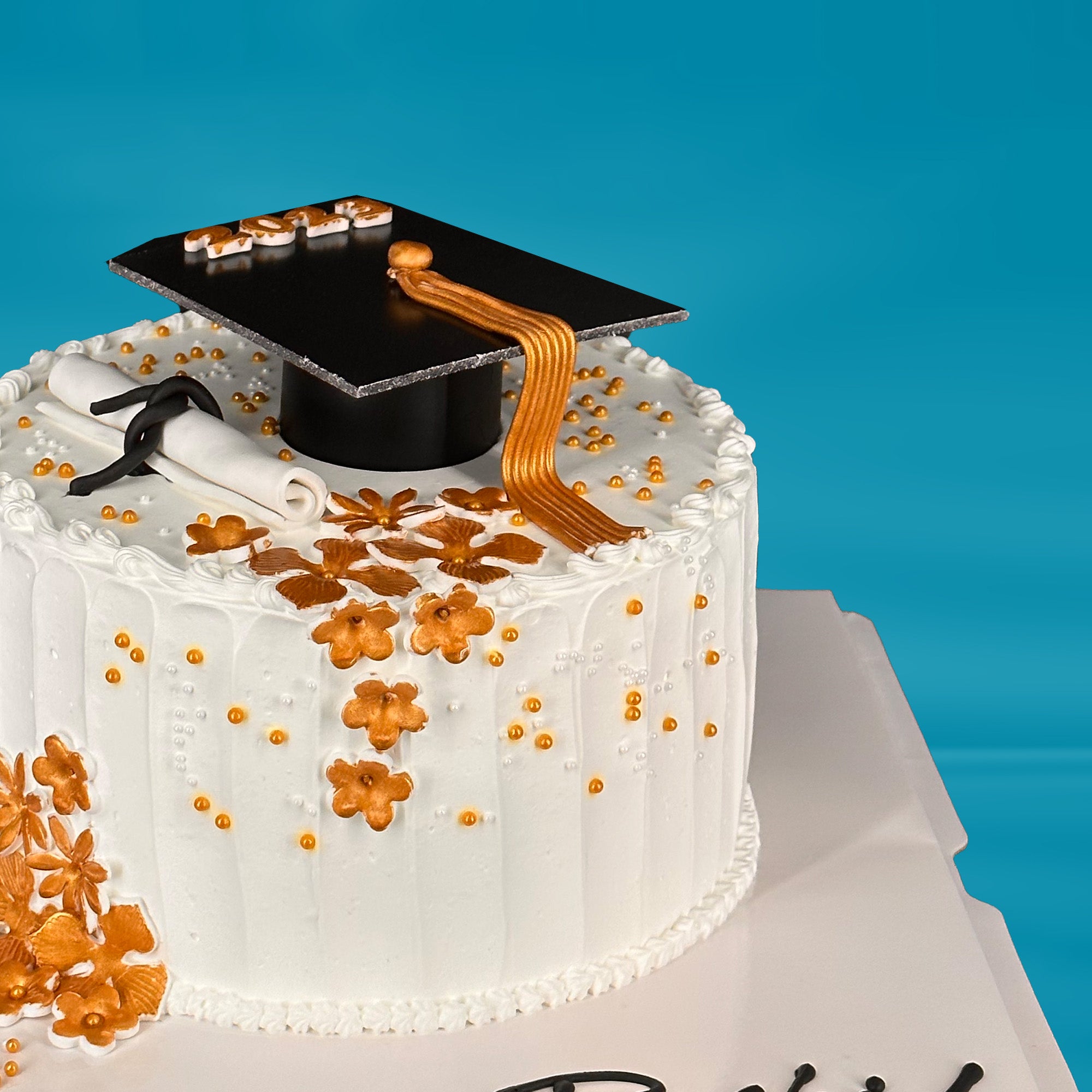 Golden blossom white graduation cake