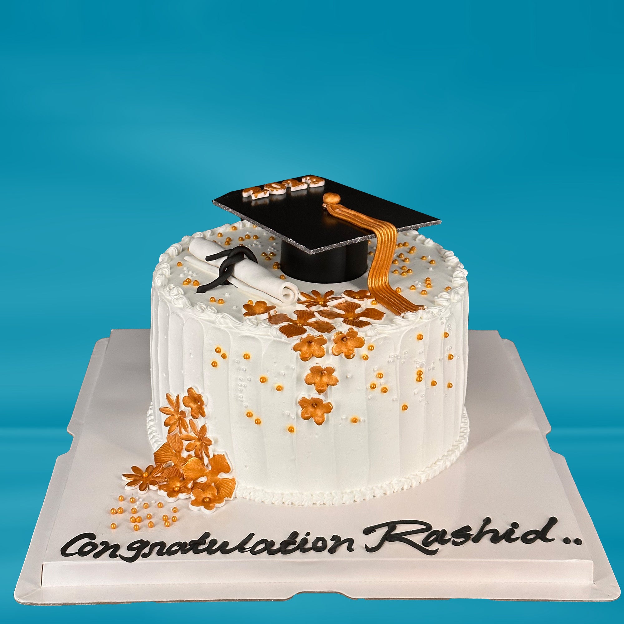 Golden blossom white graduation cake