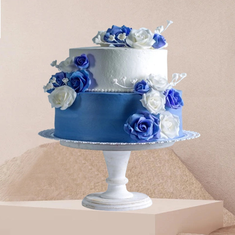 Beautiful Two Tier White and Blue Cake with Fresh Flowers in Qatar