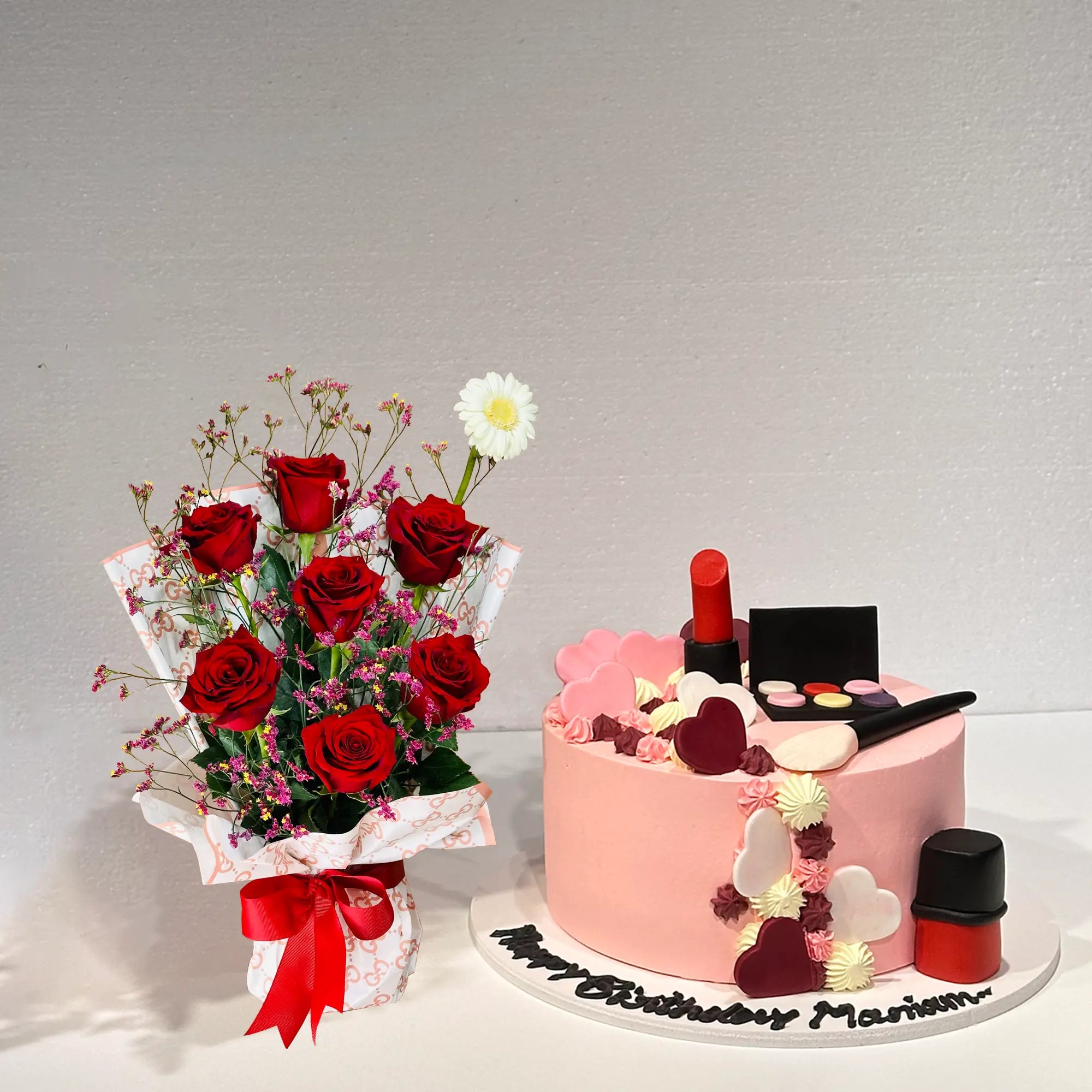 Pretty makeup cake and flower bouquet combo