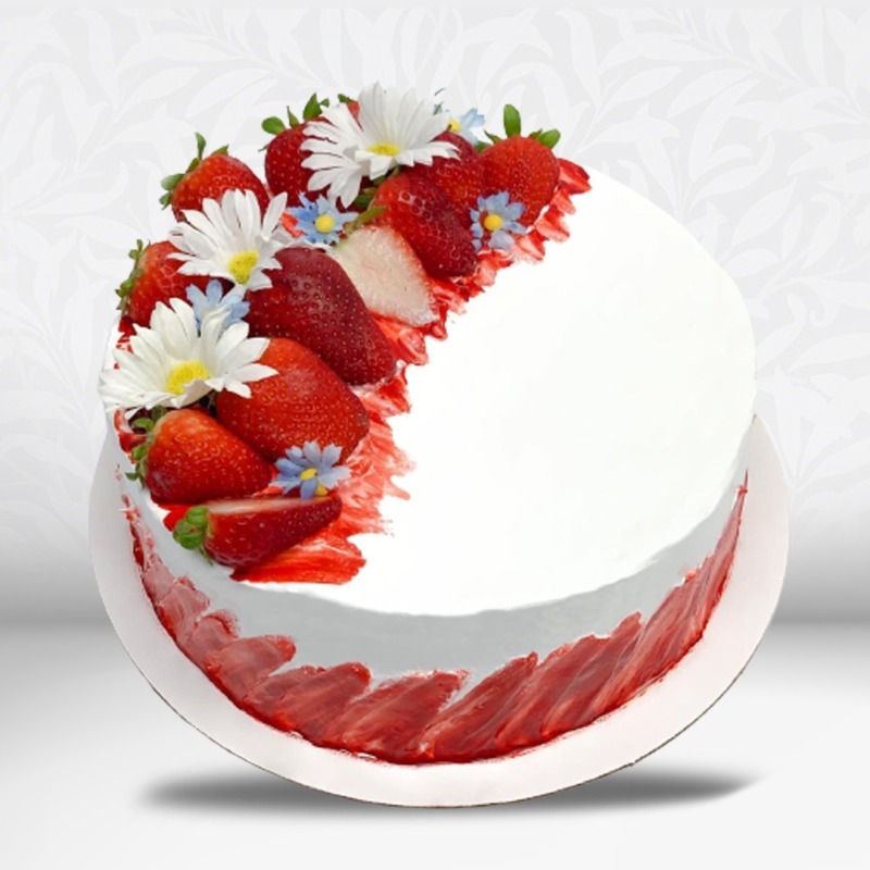 Alluring White strawberry cake with flowers and strawberries in Qatar