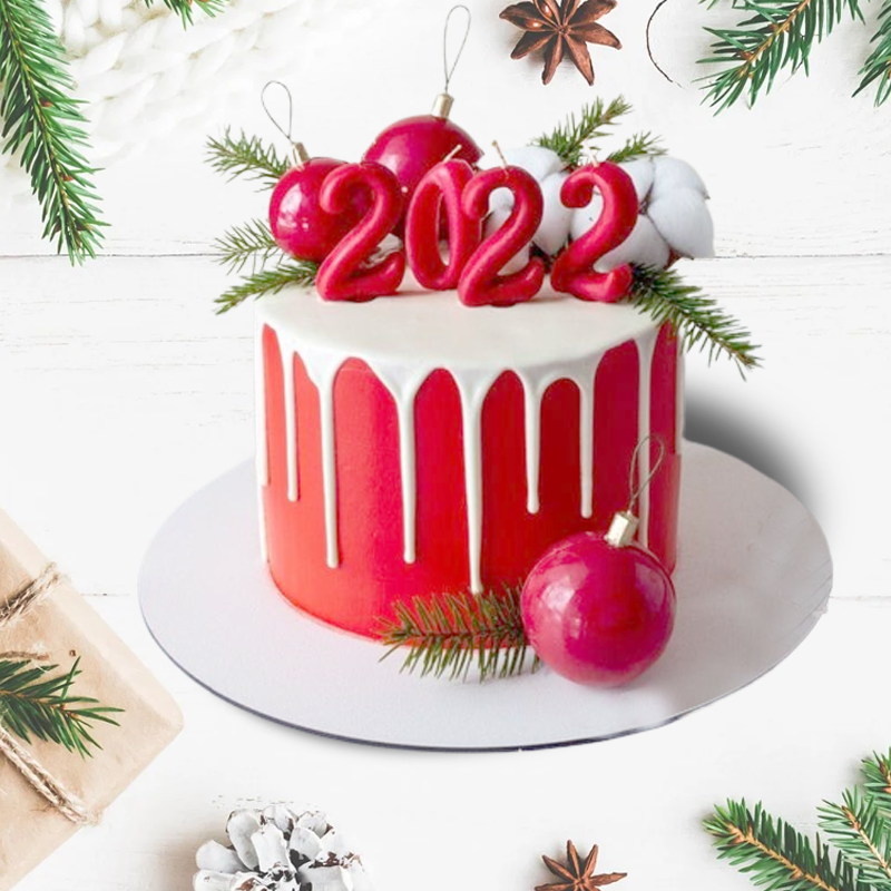Red Christmas Cake with White Cream Spread
